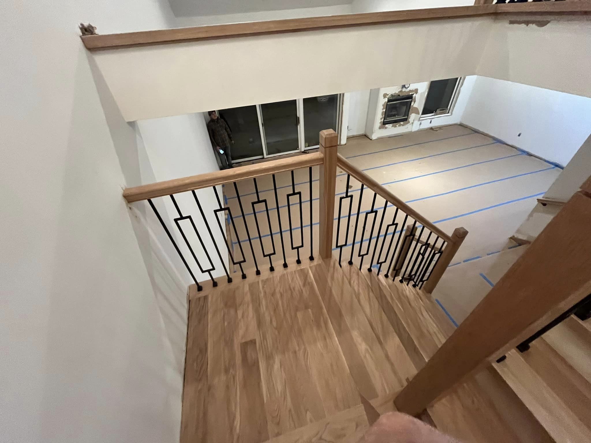 Wood and metal stair railing